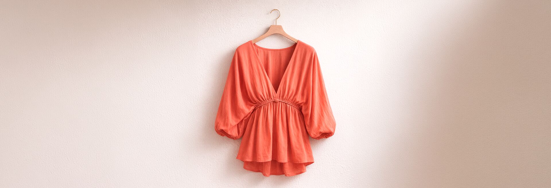blusa-laranja-mangas-bufantes.png